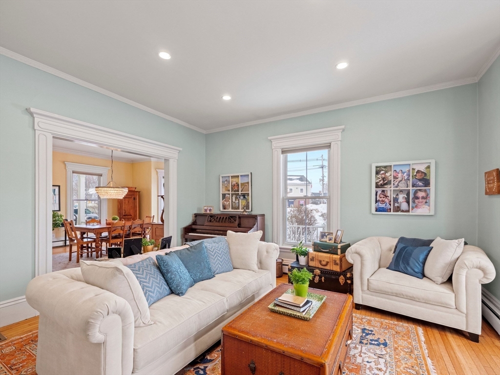 5 Holten Street Danvers, MA 01923 - Photo 15 of 42 a living room with furniture and a large window