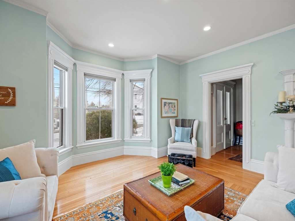 5 Holten Street Danvers, MA 01923 - Photo 17 of 42 a living room with furniture and next to a window