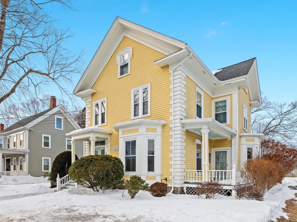 5 Holten Street Danvers, MA 01923 - Photo 2 of 42 a front view of a house with a yard