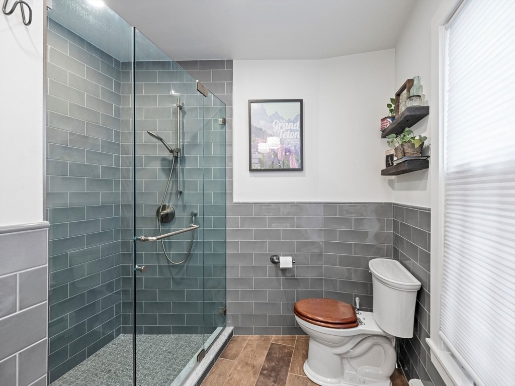 5 Holten Street Danvers, MA 01923 - Photo 29 of 42 a bathroom with a toilet and a shower