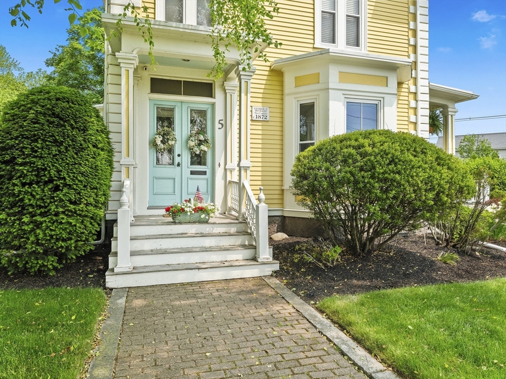 5 Holten Street Danvers, MA 01923 - Photo 34 of 42 a view of a house with a yard