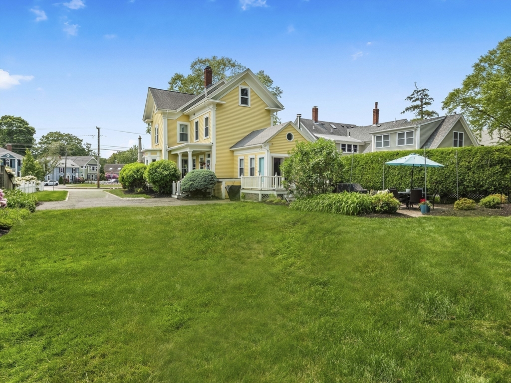 5 Holten Street Danvers, MA 01923 - Photo 42 of 42 a front view of a house with a yard