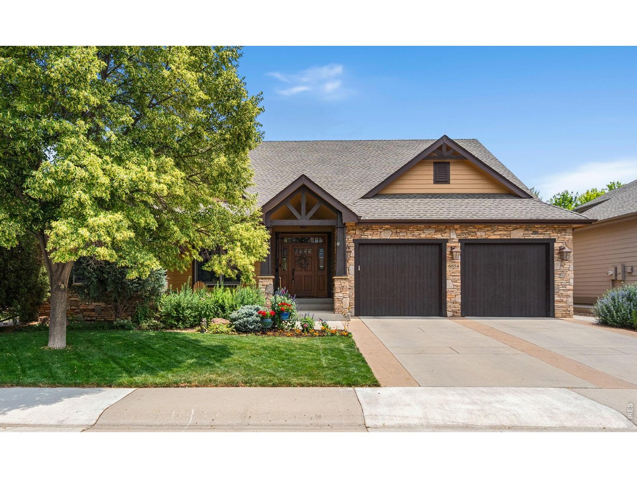 6854 Pumpkin Ridge Drive Windsor, CO 80550 - Photo 2 of 50