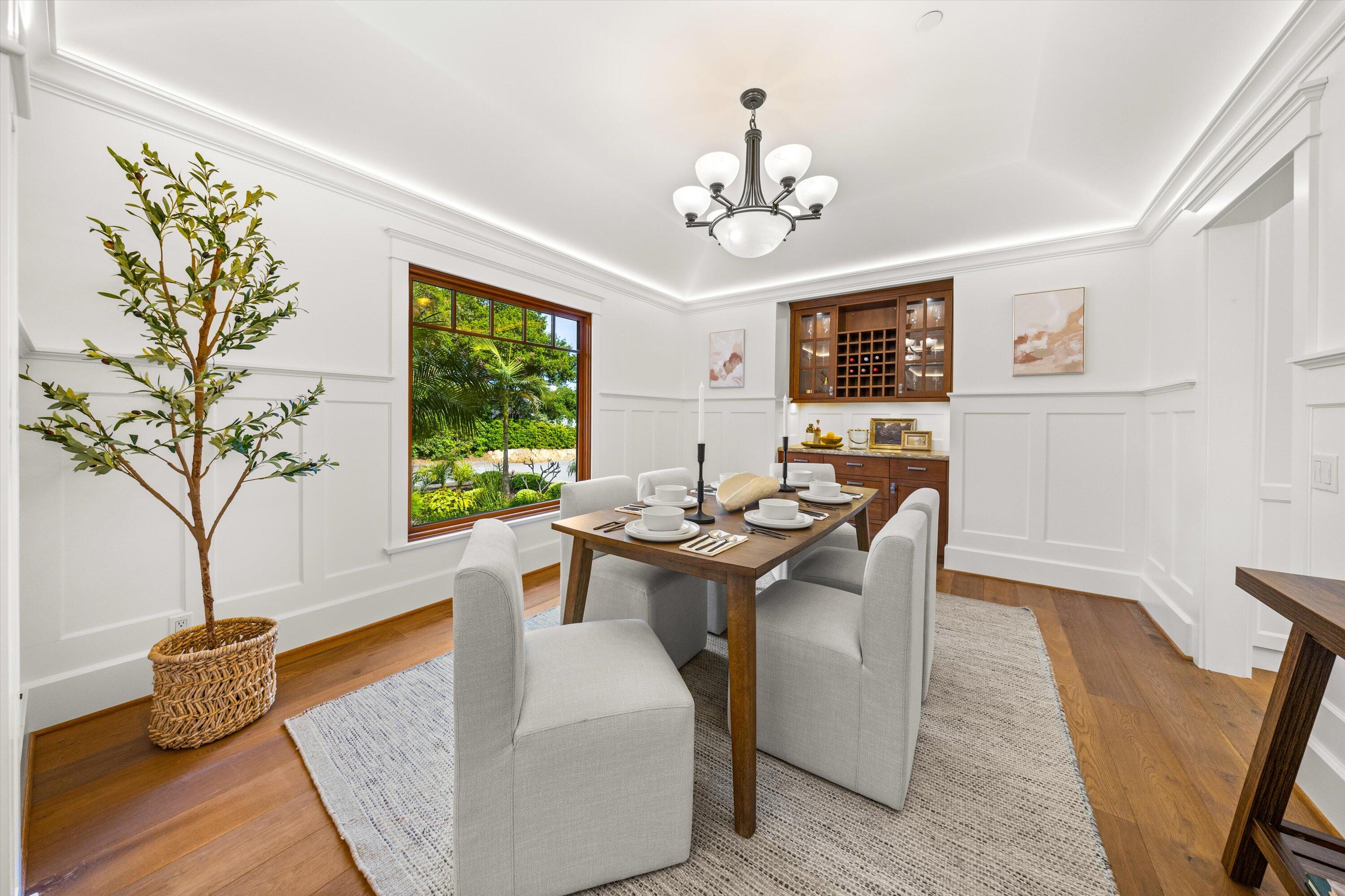 155 Santa Isabel Lane Montecito, CA 93108 - Photo 12 of 37 a view of a dining room with furniture window and wooden floor