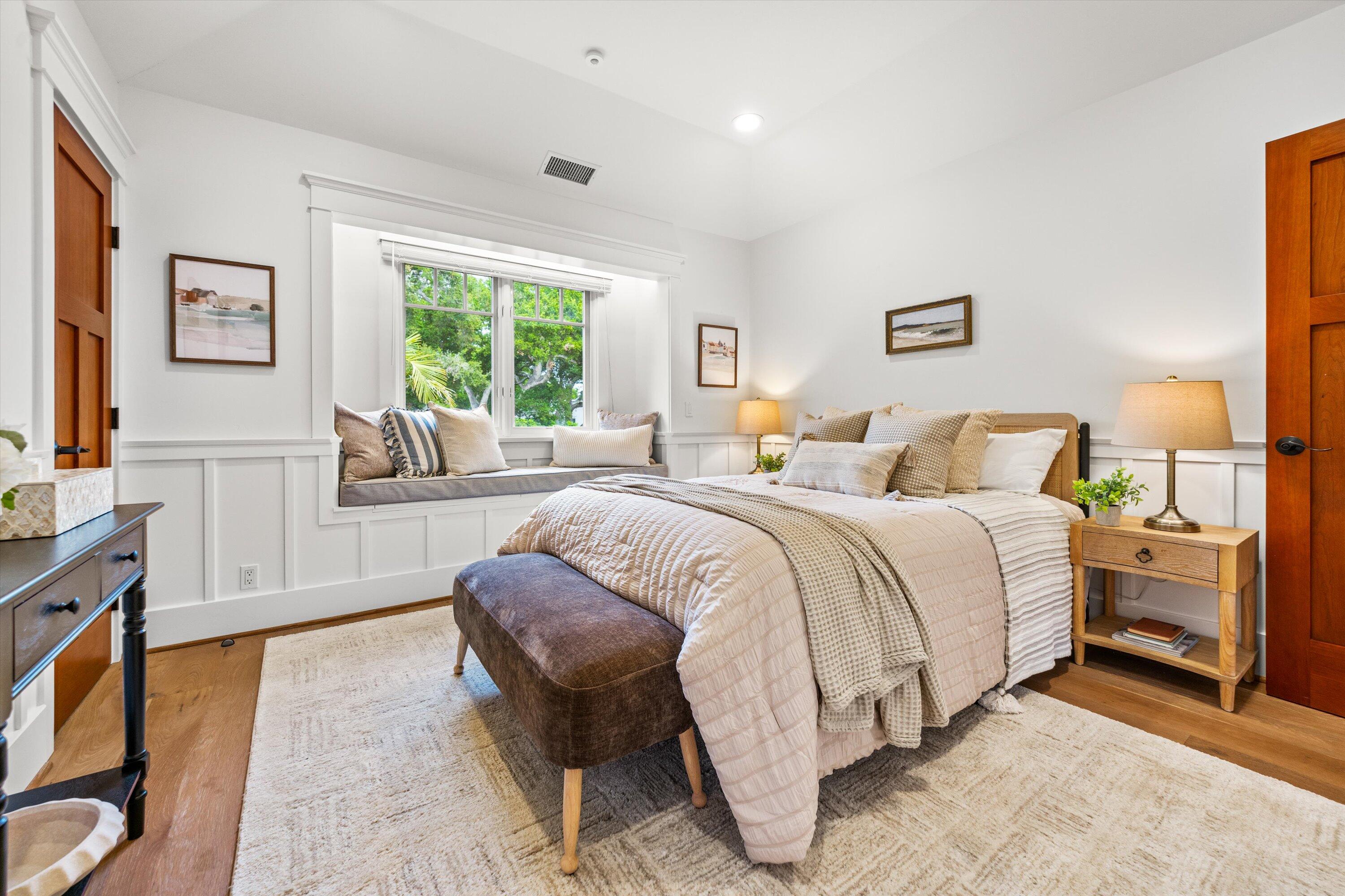 155 Santa Isabel Lane Montecito, CA 93108 - Photo 20 of 37 a spacious bedroom with a bed and a large window