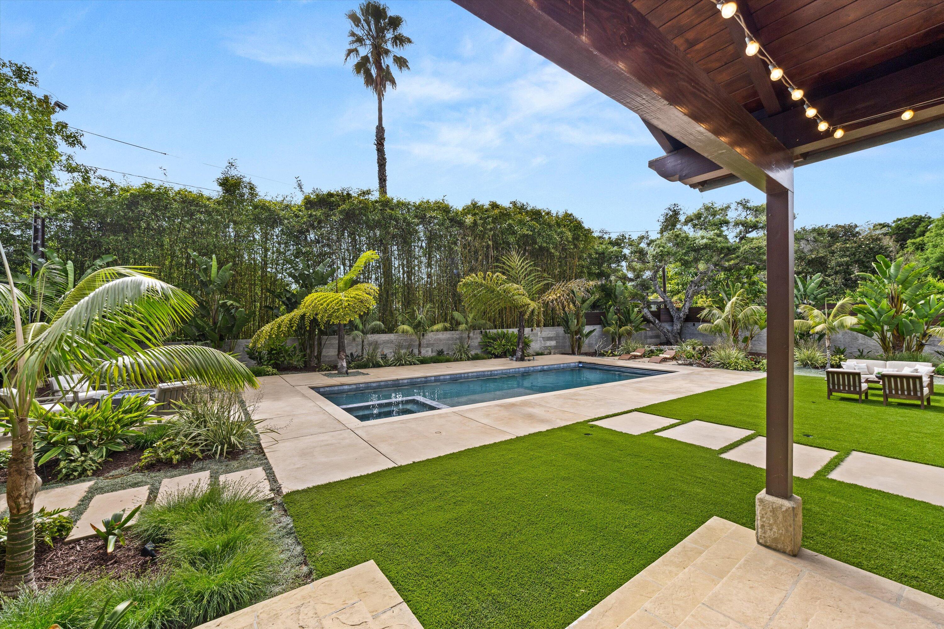 155 Santa Isabel Lane Montecito, CA 93108 - Photo 28 of 37 a view of a garden with a tree