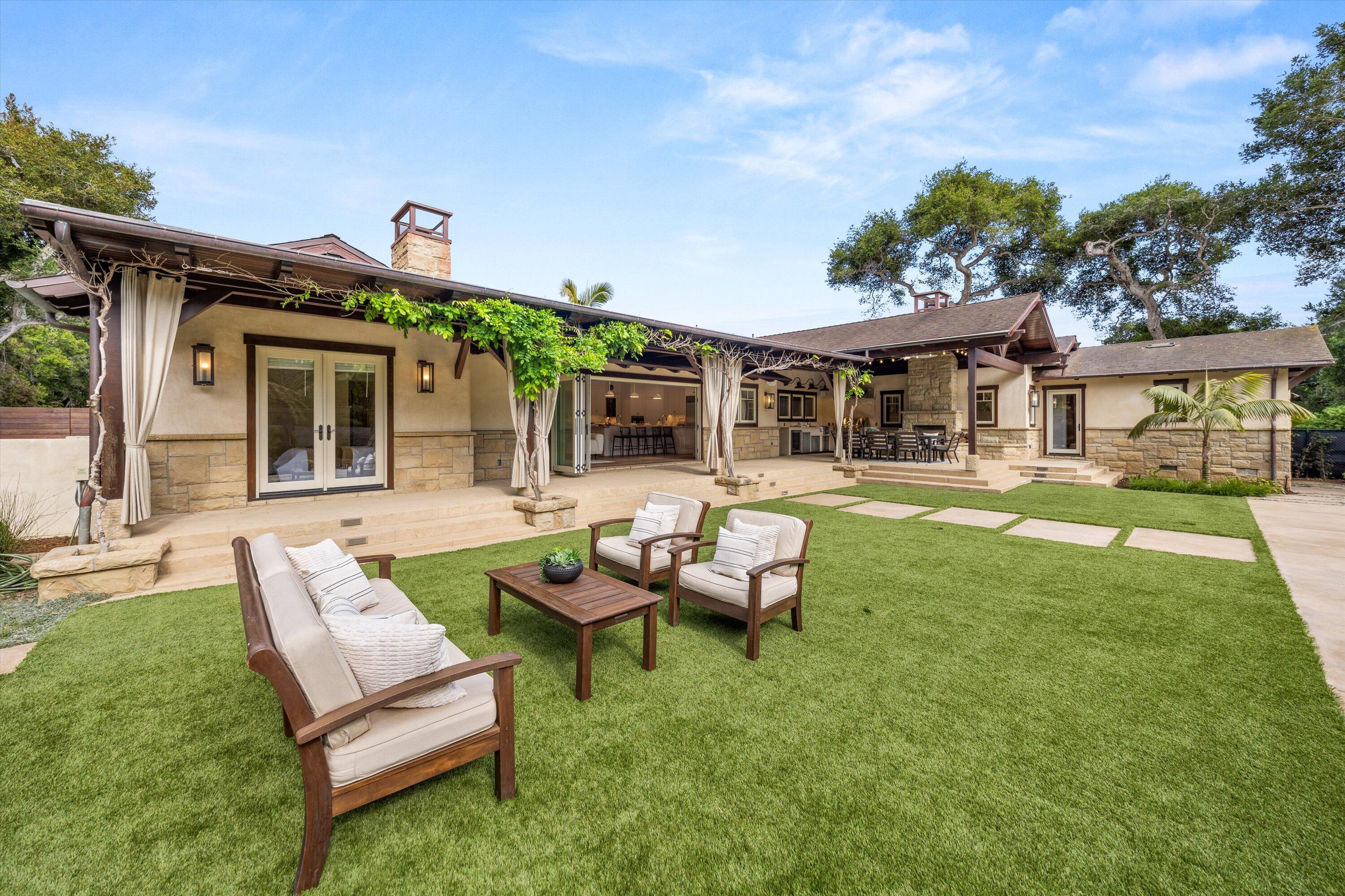 155 Santa Isabel Lane Montecito, CA 93108 - Photo 29 of 37 a view of a house with backyard porch and sitting area