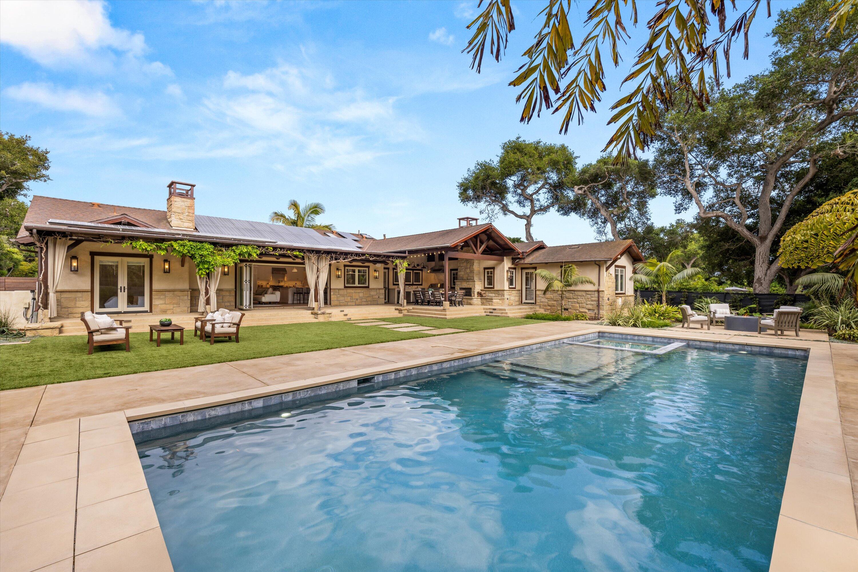155 Santa Isabel Lane Montecito, CA 93108 - Photo 30 of 37 a front view of a house with swimming pool having outdoor seating