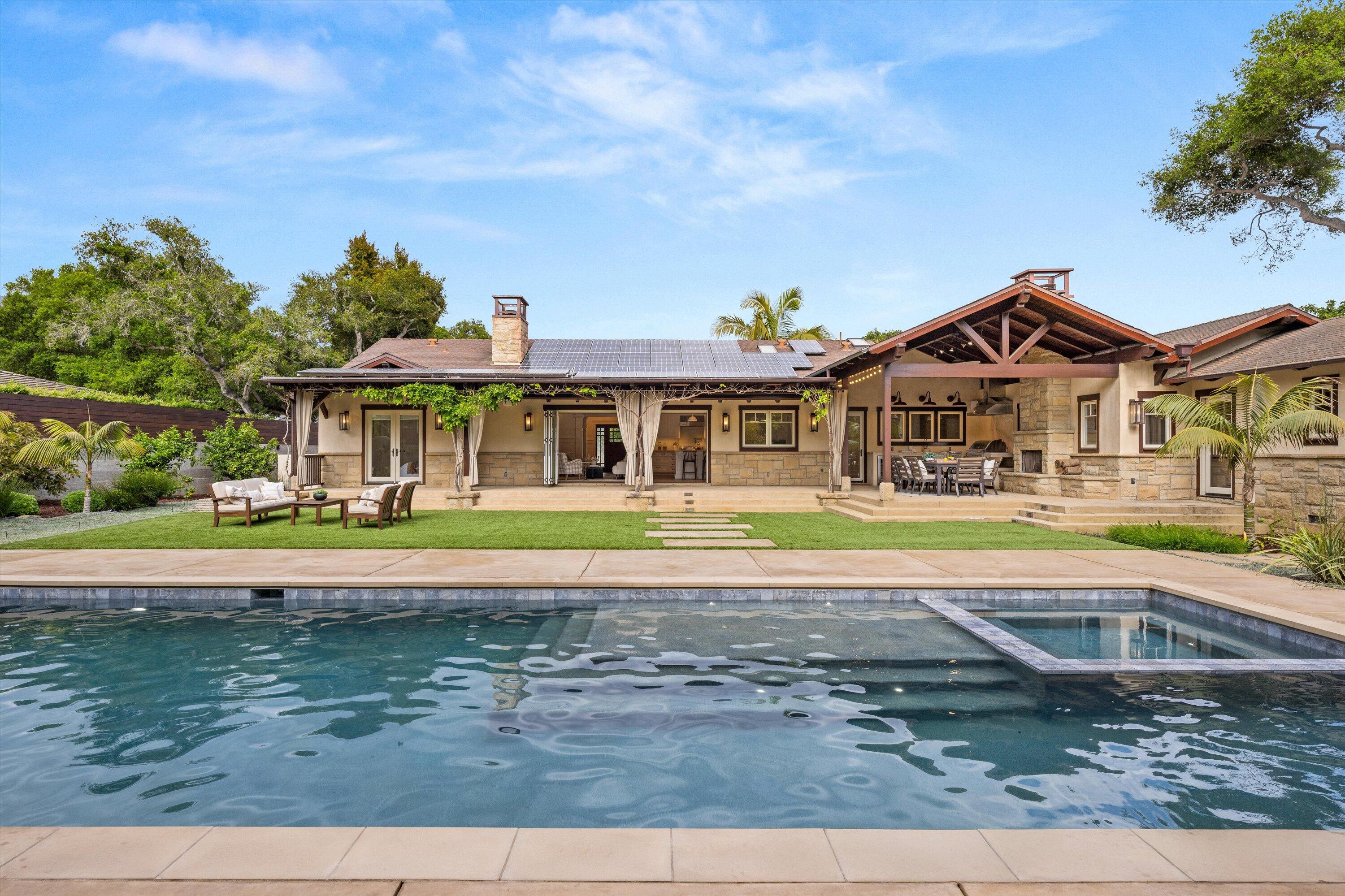 155 Santa Isabel Lane Montecito, CA 93108 - Photo 31 of 37 a view of a big house with a big yard and large trees