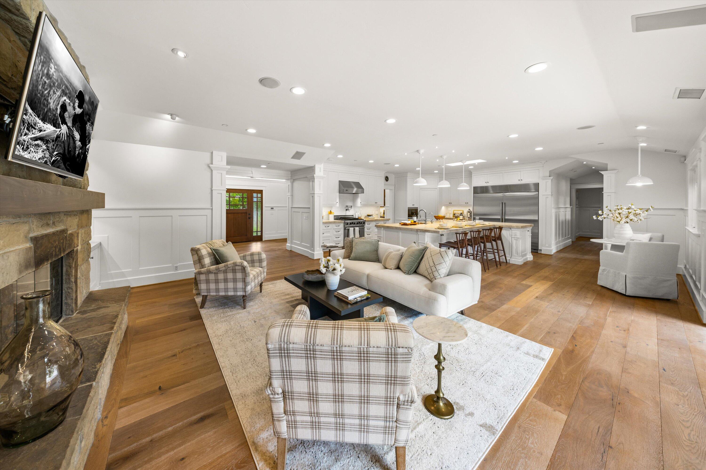 155 Santa Isabel Lane Montecito, CA 93108 - Photo 6 of 37 a living room with furniture and a fireplace
