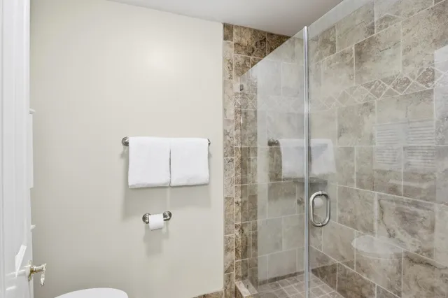 a picture of door with an open kitchen