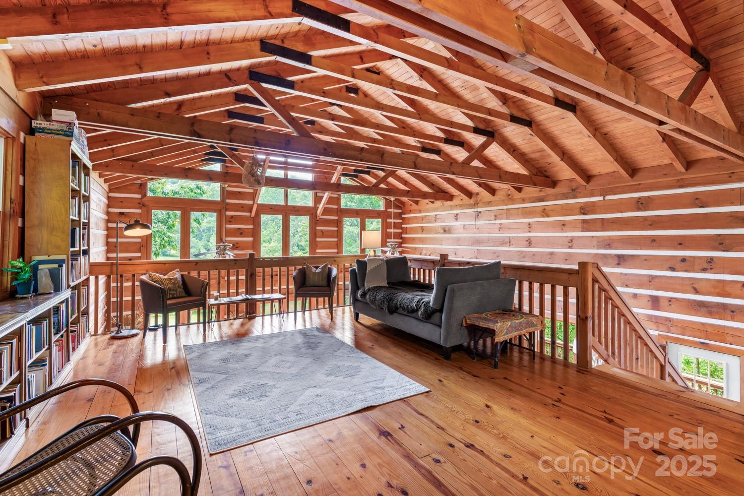 1745 Sugar Camp Road Marshall, NC 28753 - Photo 16 of 41 a roof deck with table and chairs