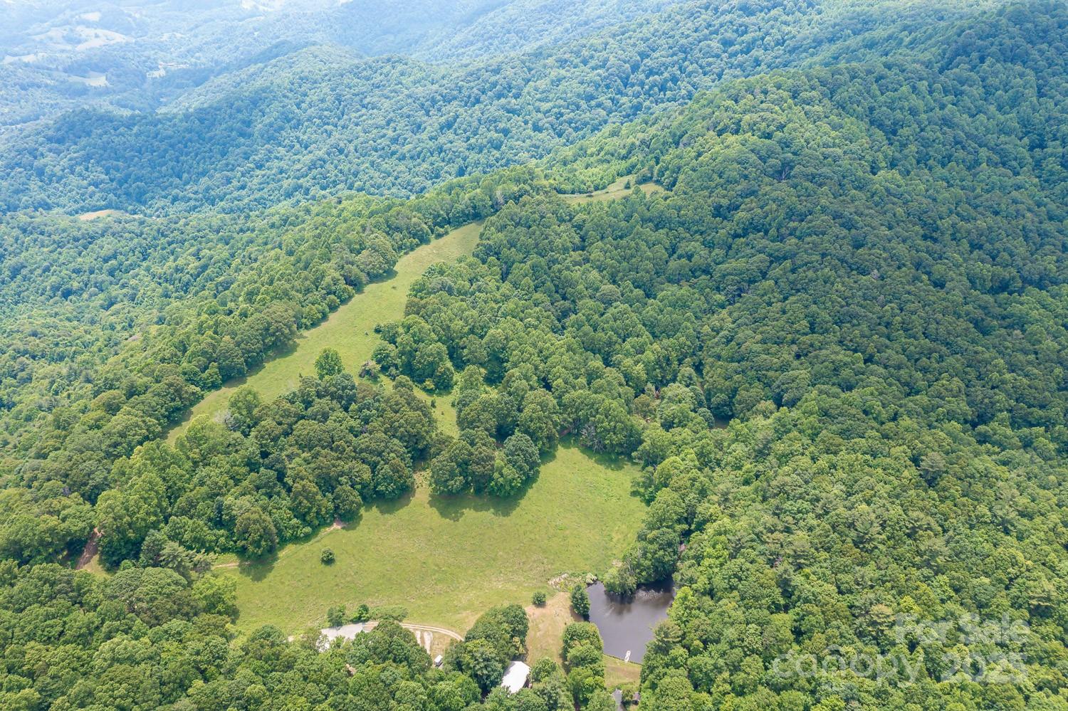 1745 Sugar Camp Road Marshall, NC 28753 - Photo 36 of 41 a view of a lake view with houses
