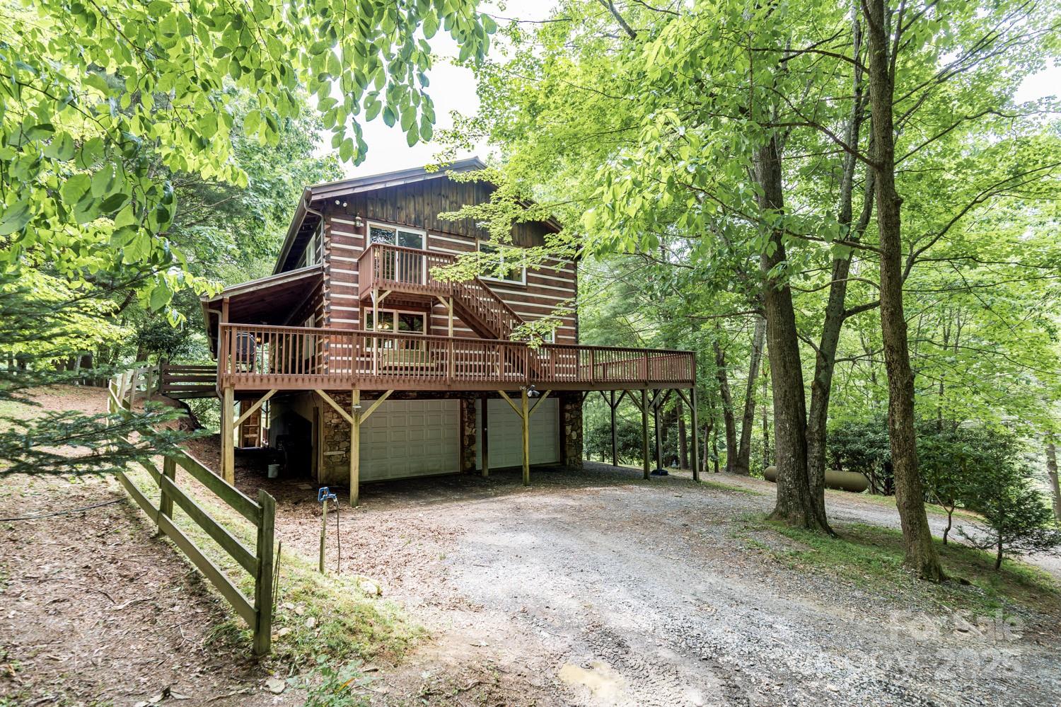 1745 Sugar Camp Road Marshall, NC 28753 - Photo 40 of 41 a front view of a house with a yard