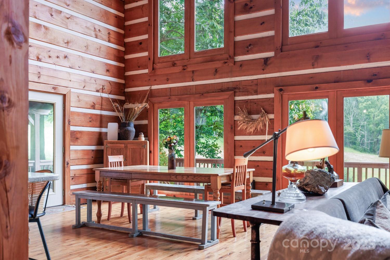 1745 Sugar Camp Road Marshall, NC 28753 - Photo 6 of 41 a living room with furniture and a large window