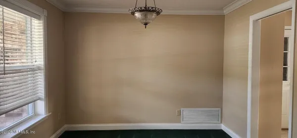 a view of a small space with a window