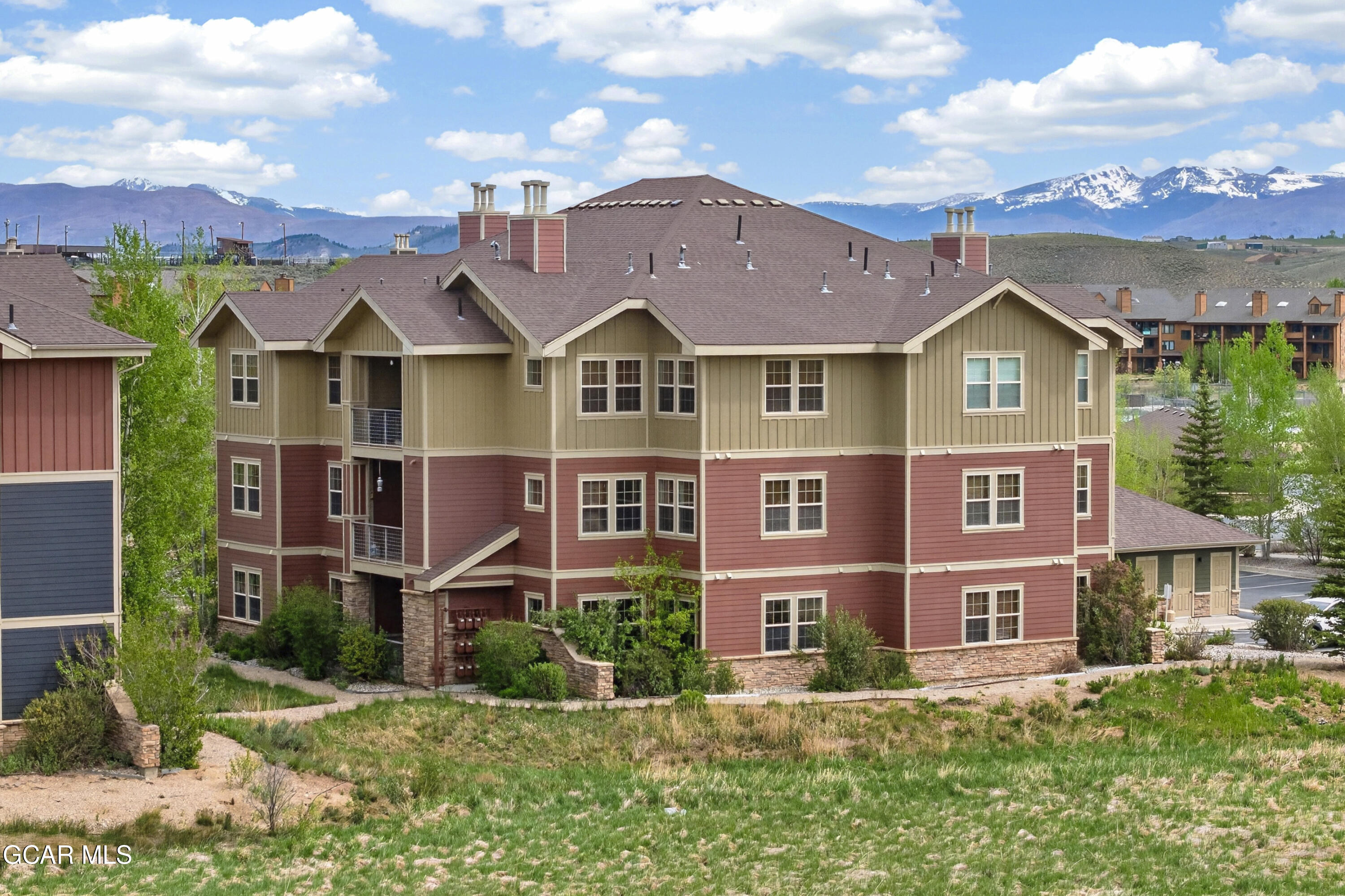 158 Village Road Granby, CO 80446 - Photo 23 of 46 front view of a house with a yard