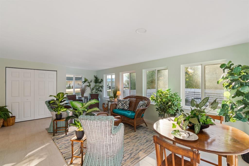 108 Northwest 2nd Street Williston, FL 32696 - Photo 19 of 45 a living room with furniture potted plant and a window
