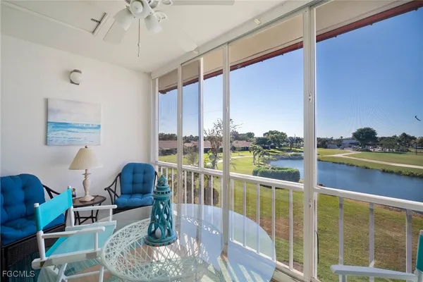 a living room with large windows