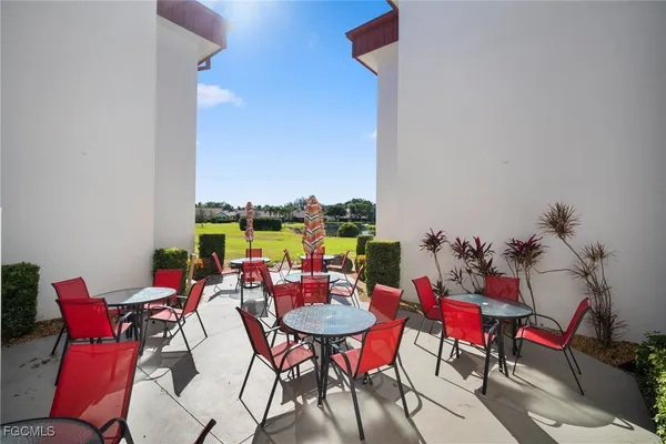 an outdoor space with furniture