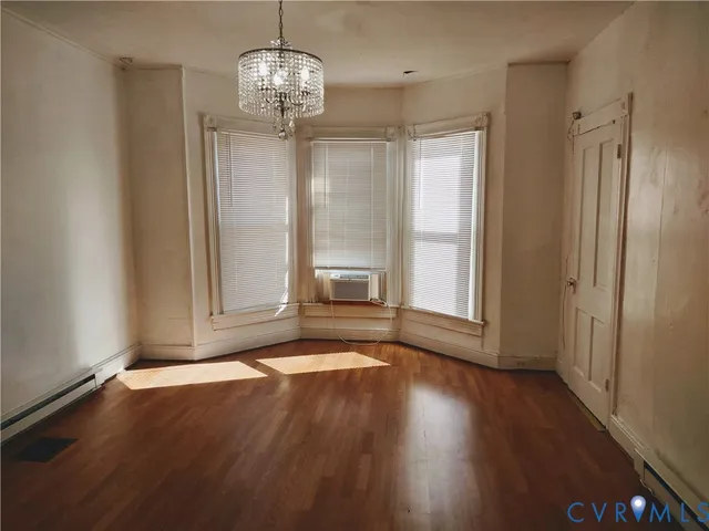 a view of livingroom with hardwood floor and window