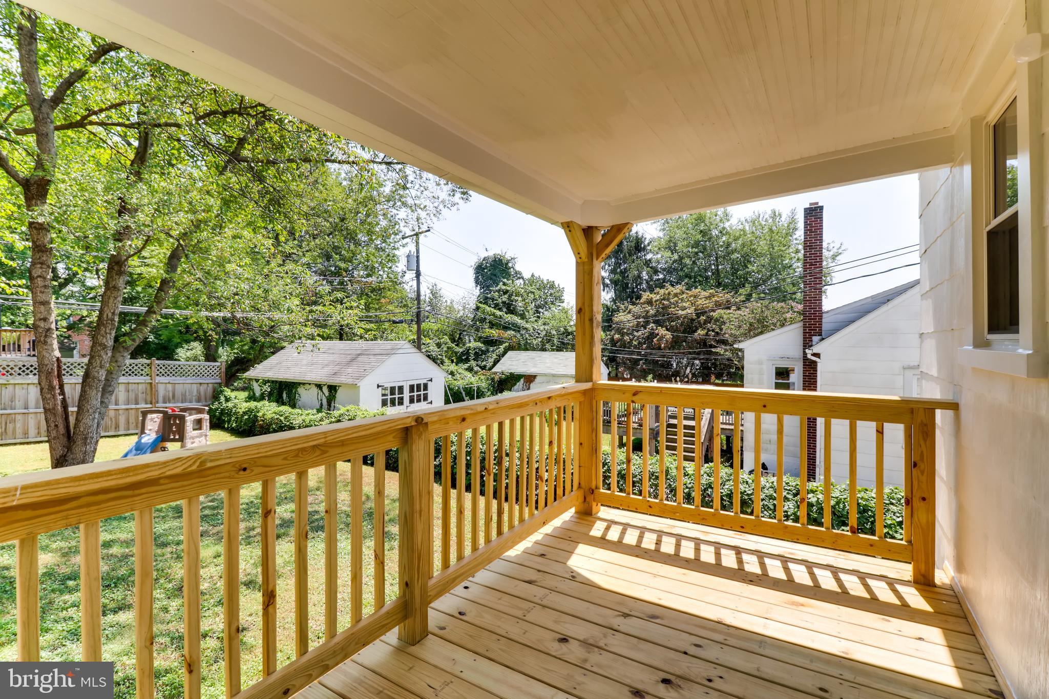 6111 Tramore Road Baltimore, MD 21214 - Photo 26 of 28 New Covered Back Deck overlooking Back Yard