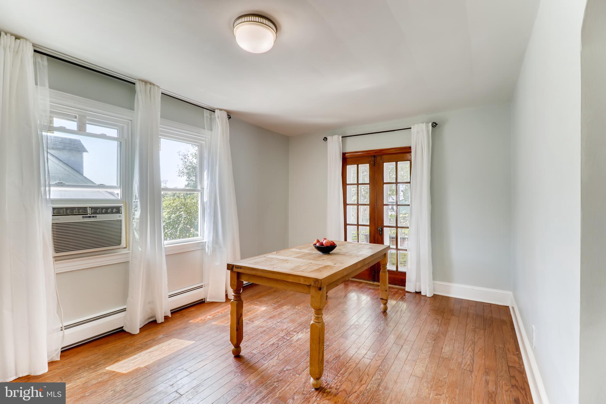 6111 Tramore Road Baltimore, MD 21214 - Photo 6 of 28 Dining Room with Original French Doors