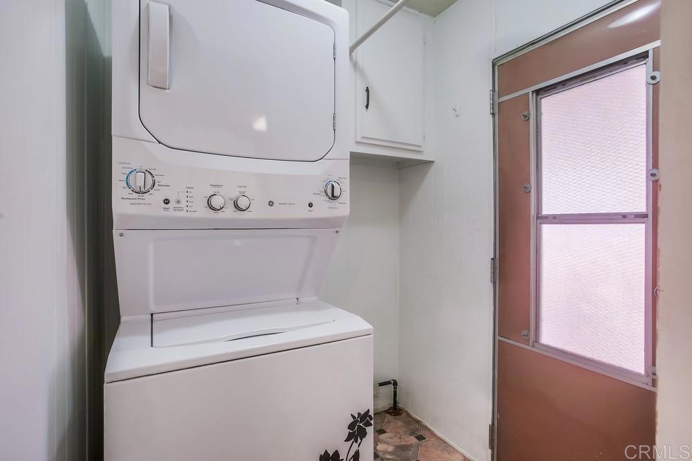 1506 Oak Drive, Unit 22 Vista, CA 92084 - Photo 36 of 58 a utility room with dryer and washer