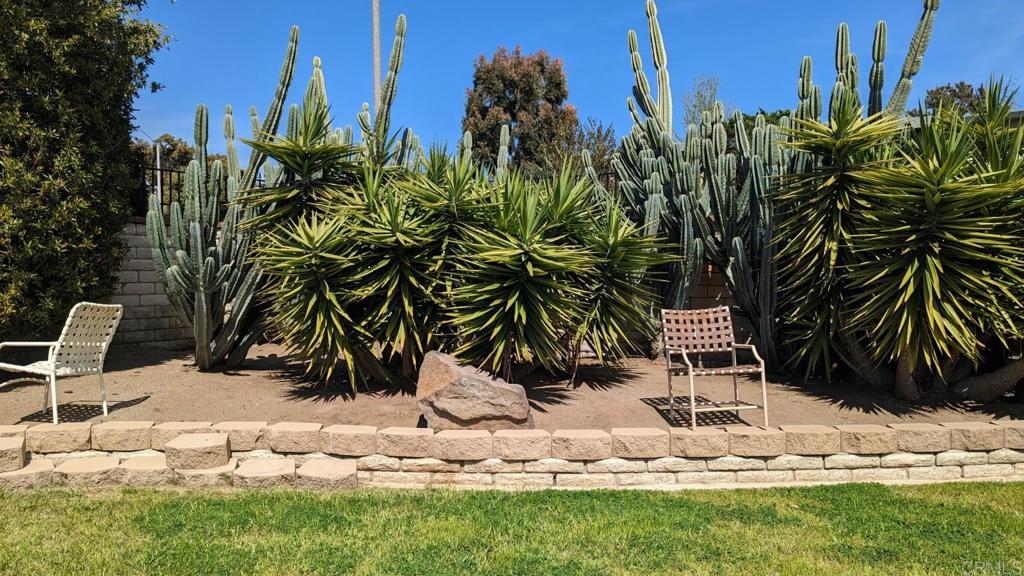 1506 Oak Drive, Unit 22 Vista, CA 92084 - Photo 57 of 58 a view of a yard with an outdoor space