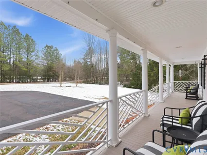 a view of a patio with a backyard
