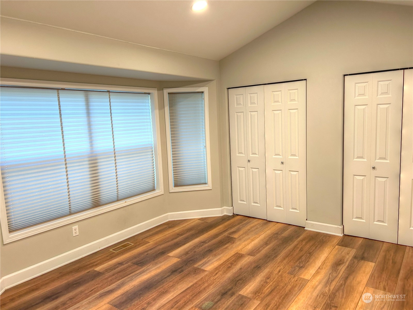 18835 Southeast Petrovitsky Road Renton, WA 98058 - Photo 11 of 34 a view of an empty room with wooden floor