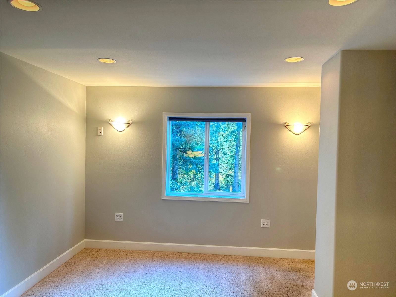 18835 Southeast Petrovitsky Road Renton, WA 98058 - Photo 23 of 34 an empty room with wooden floor and windows