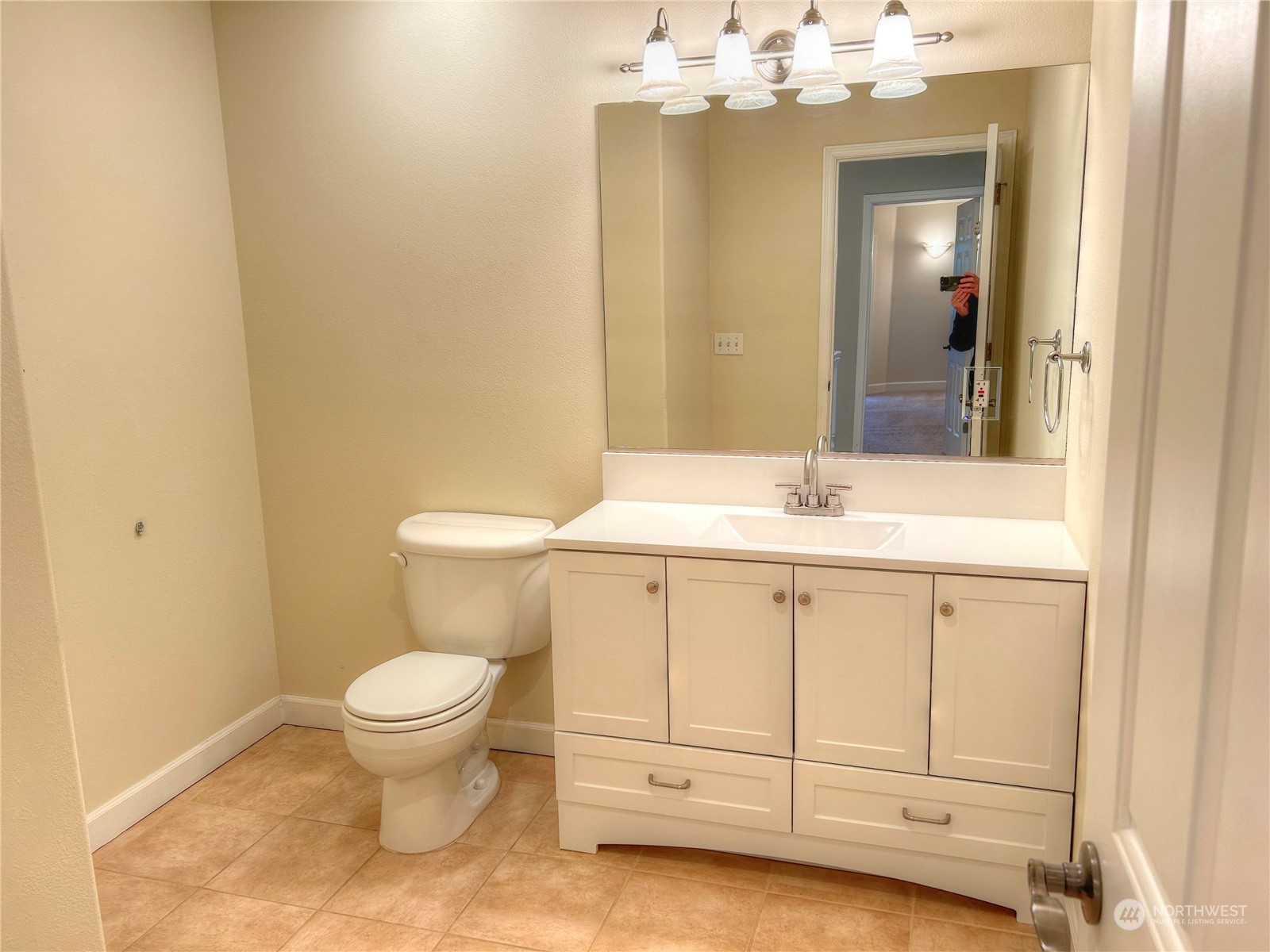 18835 Southeast Petrovitsky Road Renton, WA 98058 - Photo 24 of 34 a bathroom with a sink vanity and toilet