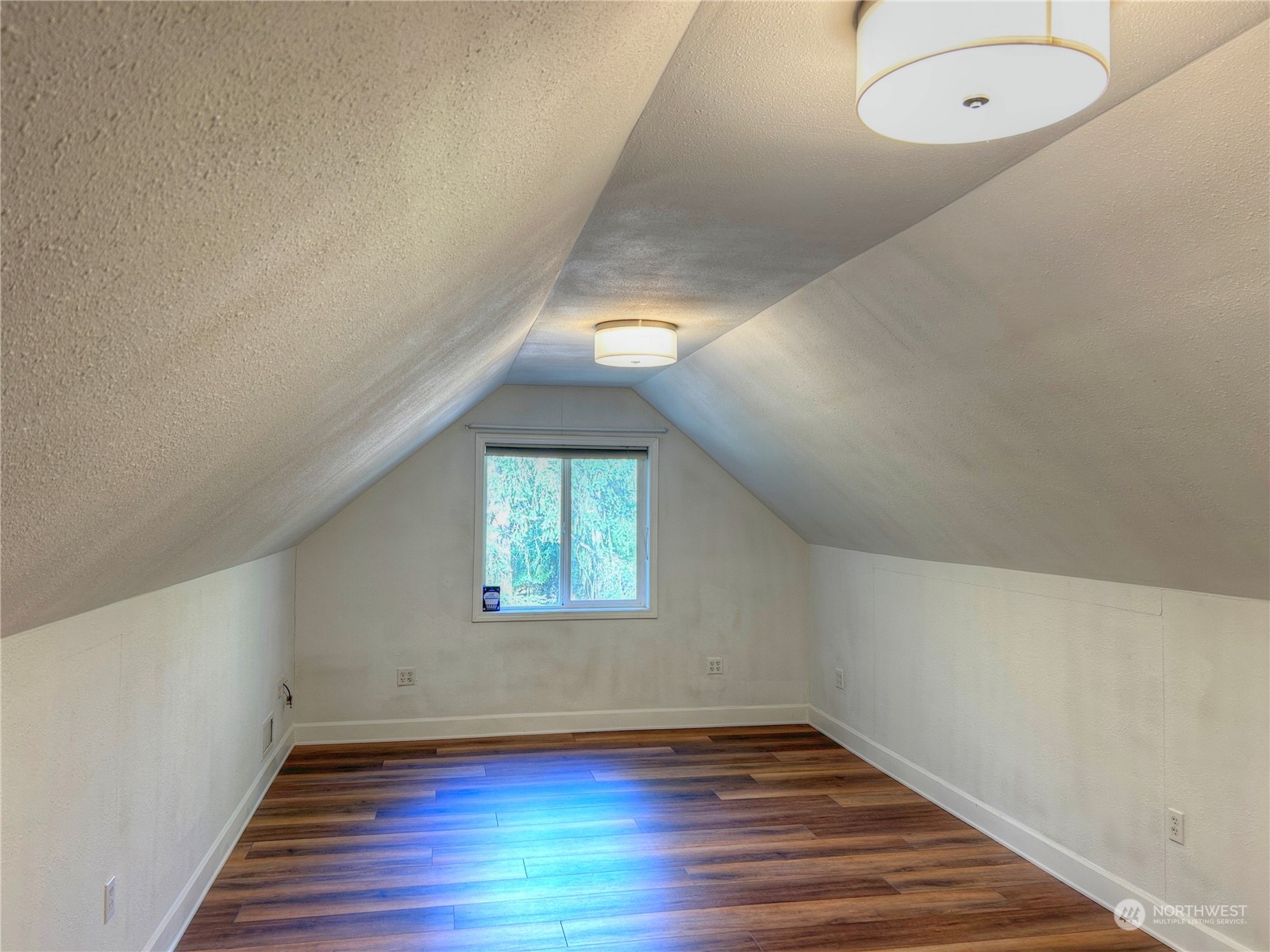 18835 Southeast Petrovitsky Road Renton, WA 98058 - Photo 25 of 34 an empty room with wooden floor and windows
