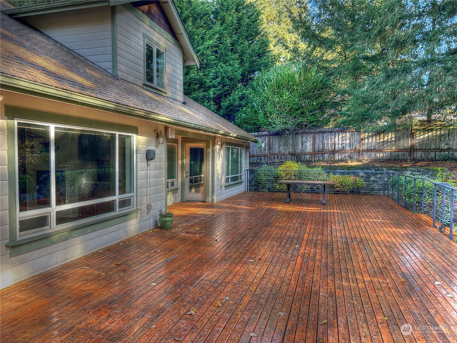 18835 Southeast Petrovitsky Road Renton, WA 98058 - Photo 28 of 34 a view of backyard with deck and outdoor seating