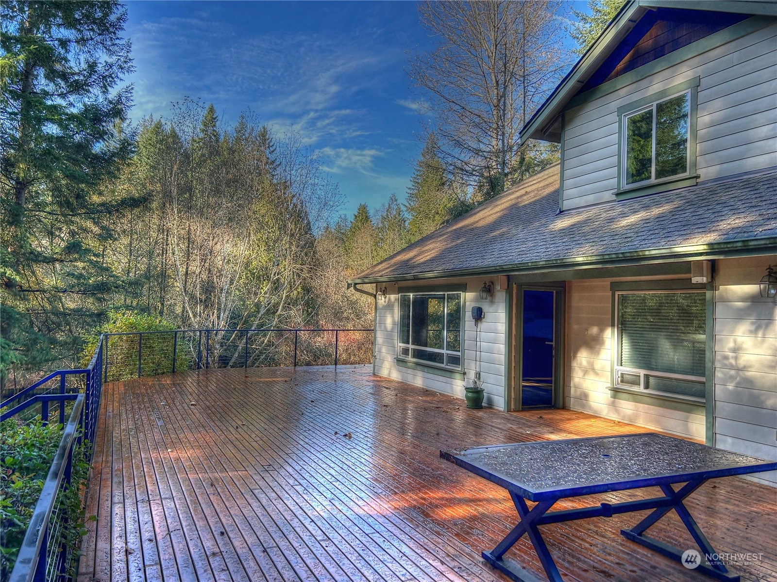 18835 Southeast Petrovitsky Road Renton, WA 98058 - Photo 29 of 34 a backyard of a house with barbeque oven table and chairs