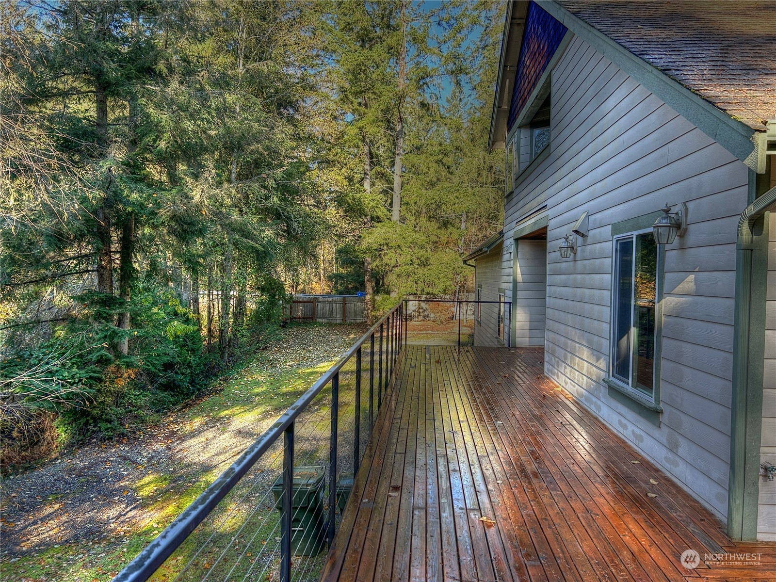 18835 Southeast Petrovitsky Road Renton, WA 98058 - Photo 31 of 34 a view of a balcony with wooden floor