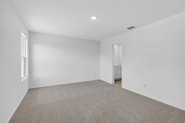 an empty room with a natural light