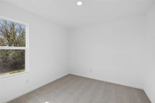 a view of a small space with a window