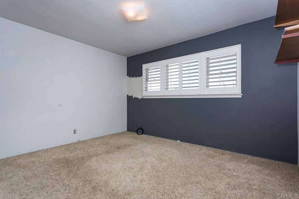 323 Hill Drive Vista, CA 92083 - Photo 16 of 39 a view of an empty room with a window