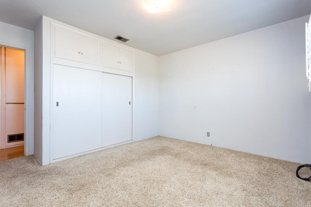 323 Hill Drive Vista, CA 92083 - Photo 17 of 39 an empty room with closet