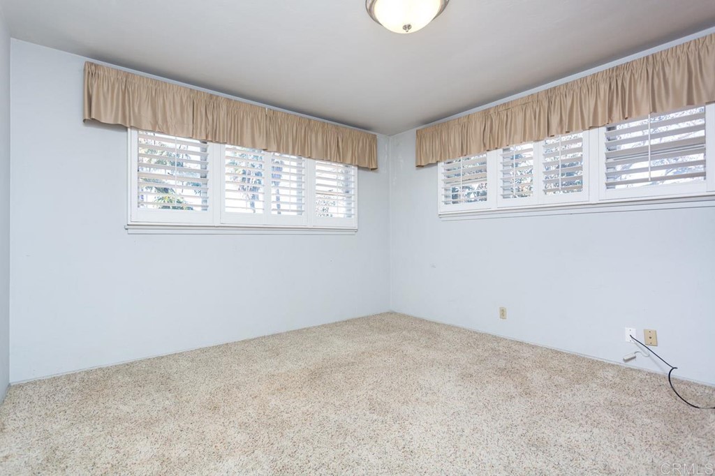 323 Hill Drive Vista, CA 92083 - Photo 18 of 39 a view of an empty room with a window