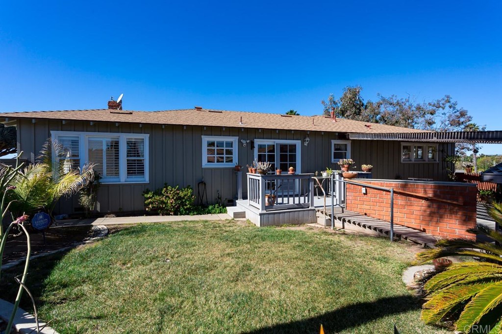 323 Hill Drive Vista, CA 92083 - Photo 24 of 39 a view of a house with patio outdoor seating