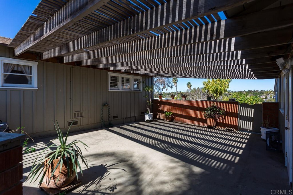 323 Hill Drive Vista, CA 92083 - Photo 26 of 39 a balcony with furniture and a potted plant