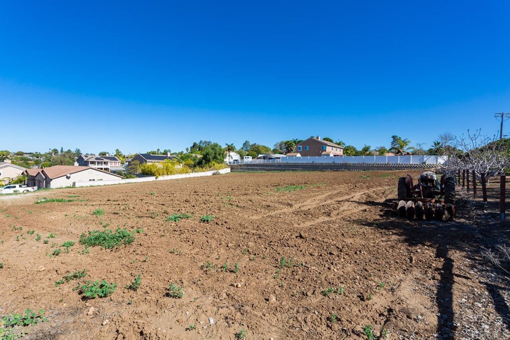323 Hill Drive Vista, CA 92083 - Photo 32 of 39 a view of a lake with beach and city view