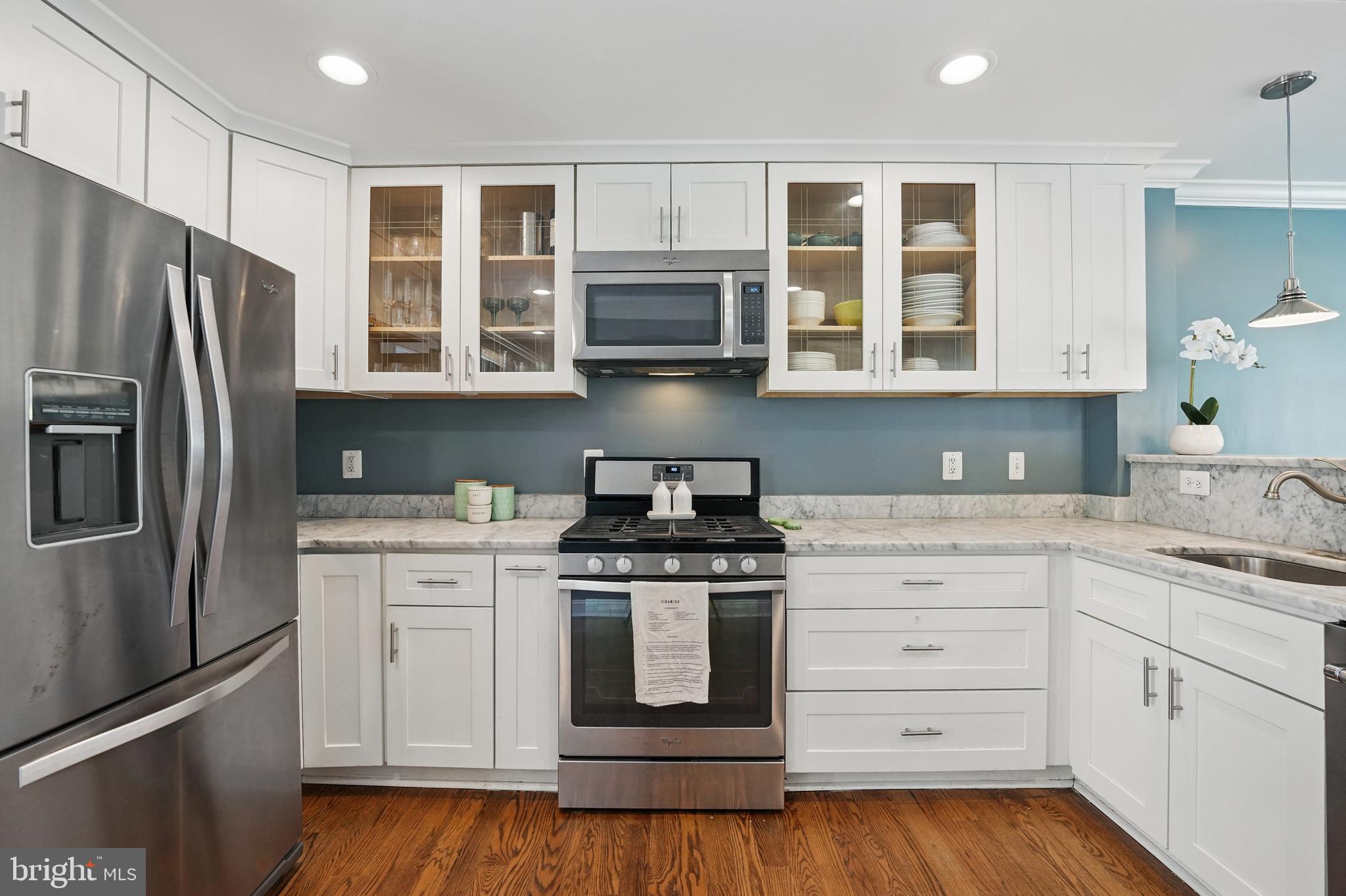 6930 27th Road North Arlington, VA 22213 - Photo 16 of 51 a kitchen with stainless steel appliances granite countertop a stove and a refrigerator