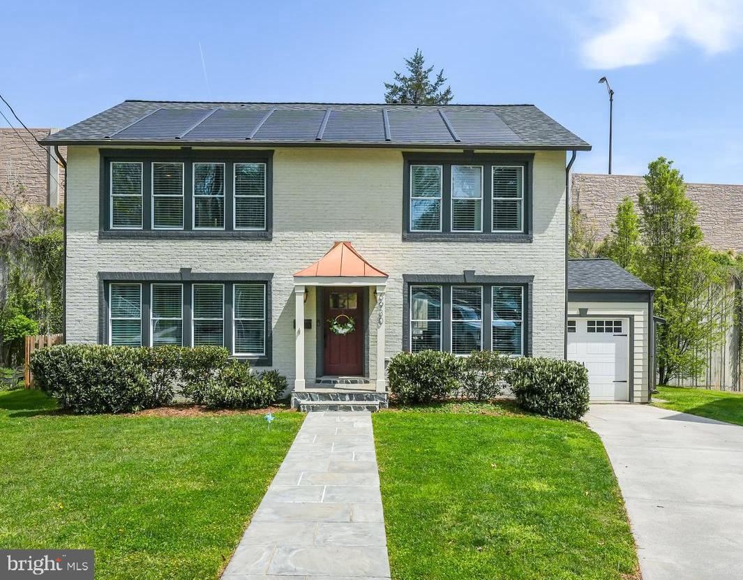 6930 27th Road North Arlington, VA 22213 - Photo 2 of 51 a front view of a house with a yard