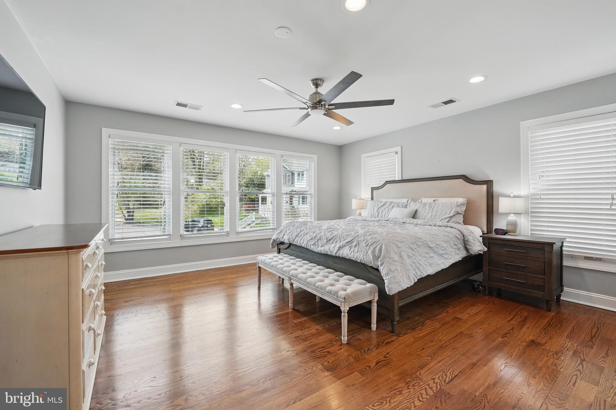 6930 27th Road North Arlington, VA 22213 - Photo 21 of 51 a bedroom with a bed and a large window with wooden floor