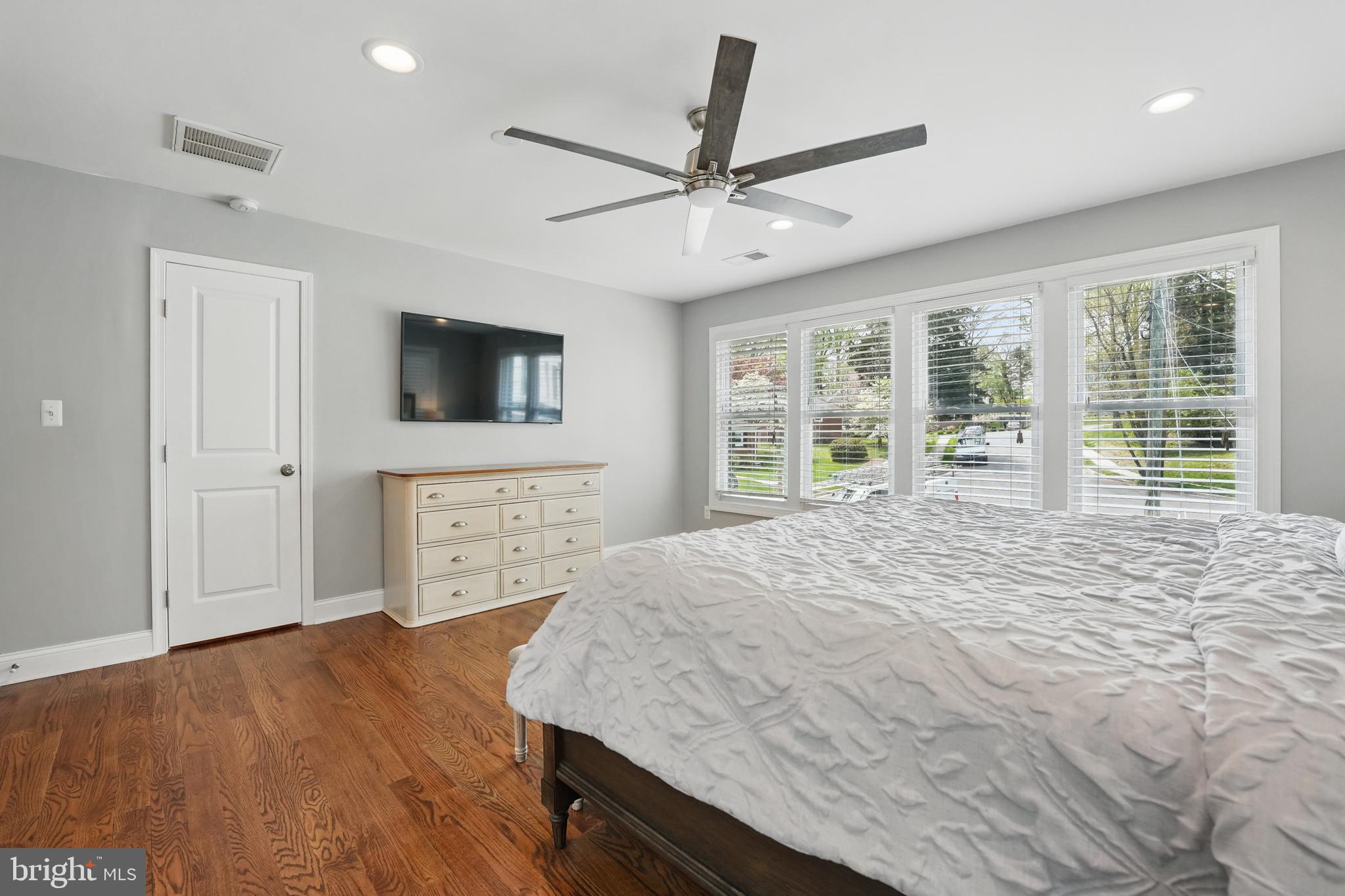 6930 27th Road North Arlington, VA 22213 - Photo 23 of 51 a bedroom with a bed and a flat screen tv