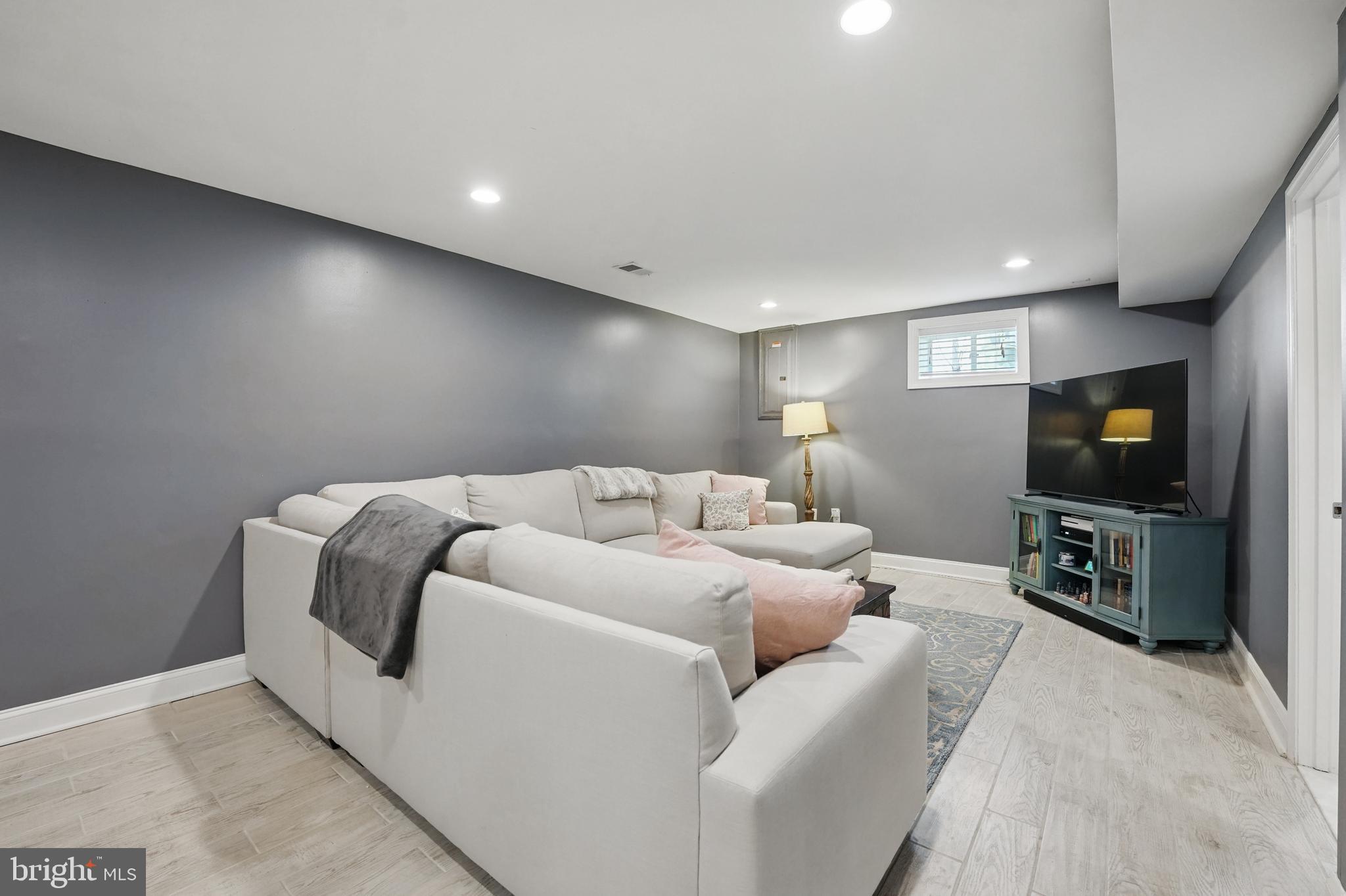 6930 27th Road North Arlington, VA 22213 - Photo 33 of 51 a living room with furniture and a flat screen tv